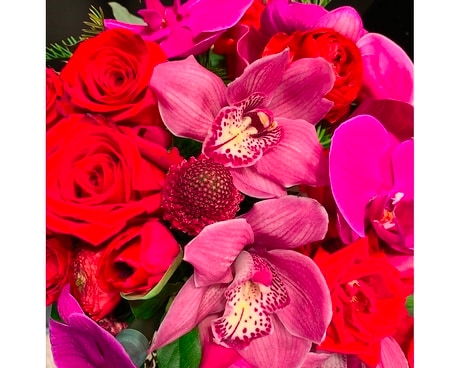 Custom Designed Arrangement-Reds and pinks Flower Arrangement