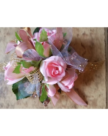 Pink Wristlet w/ pink ribbon Flower Arrangement