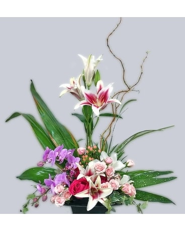 Modern Lilies And Orchids Flower Arrangement