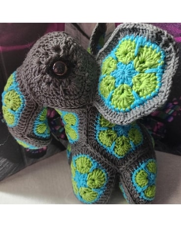 Elephant size,  inches height and  inches wide.