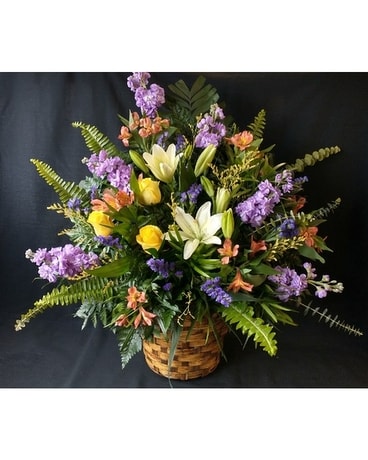 Spring Arrangement in Wicker Basket Flower Arrangement