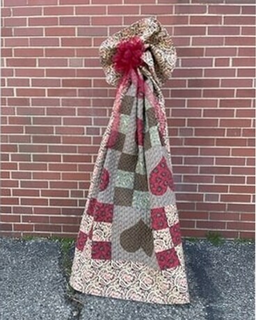 Quilt with Bow Flower Arrangement